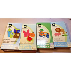 Lot Of 4 Cricut Cartridges Wildcard/My Community/Animal Kingdom/Doodlecharms